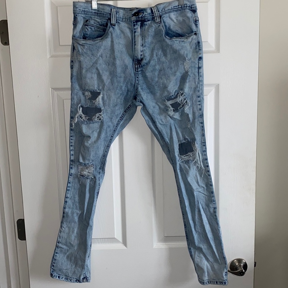 Acid wash light blue distressed jeans
